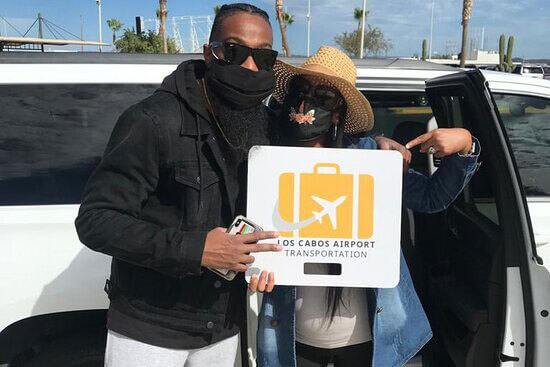 Two masked customers being picked up | Cabo Airport Transportation