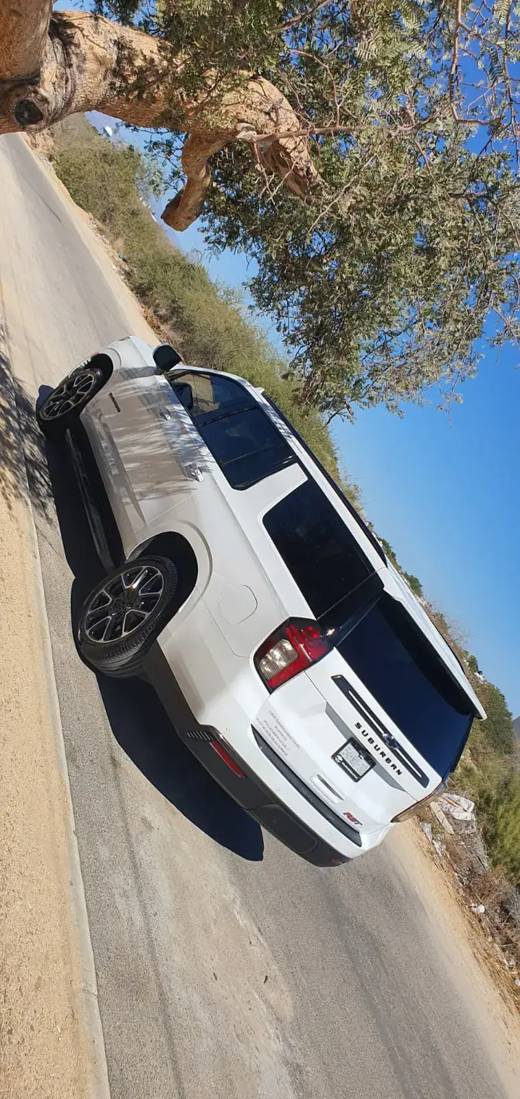 White Private luxury SUV transportation for up to 6 passengers provided by Los Cabos Airport Transportation